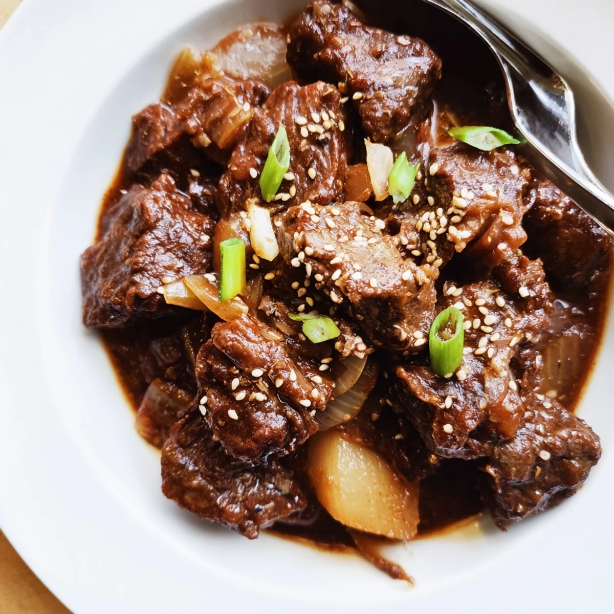 Garnished with fresh green onions, this dish is perfect for a cozy family dinner.