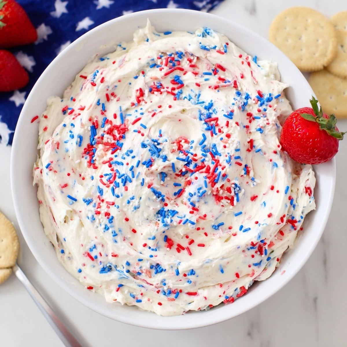 Chilled Red White And Blue Funfetti Dip served with vanilla wafers, colorful crunch
