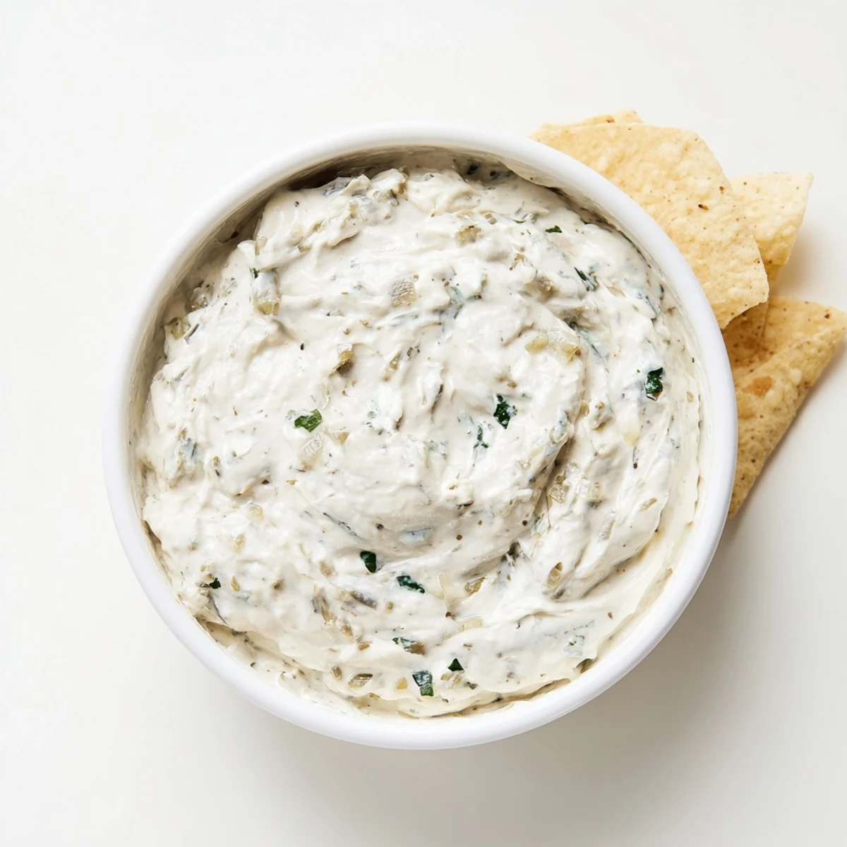 Homemade Mexican white sauce with jalapeno bits perfect for grilled meat dishes