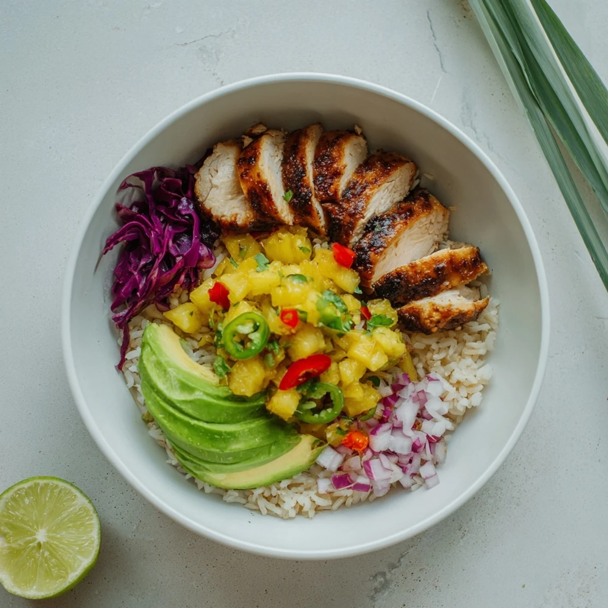 Jerk Chicken Bowl With Pineapple Salsa steaming over rice, charred chicken, bright toppings