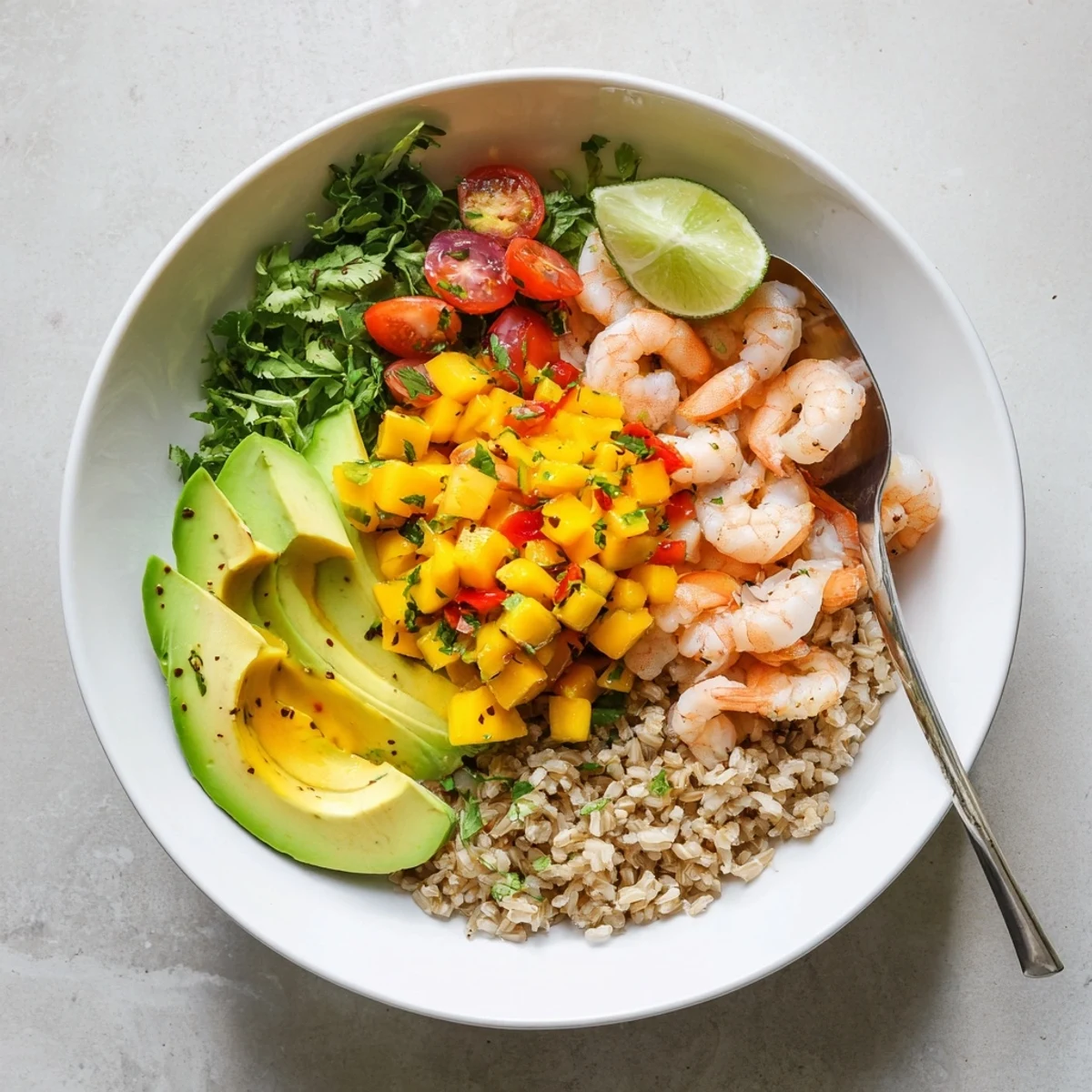 Shrimp And Avocado Bowls With Mango Salsa Lime Chili Sauce served over rice