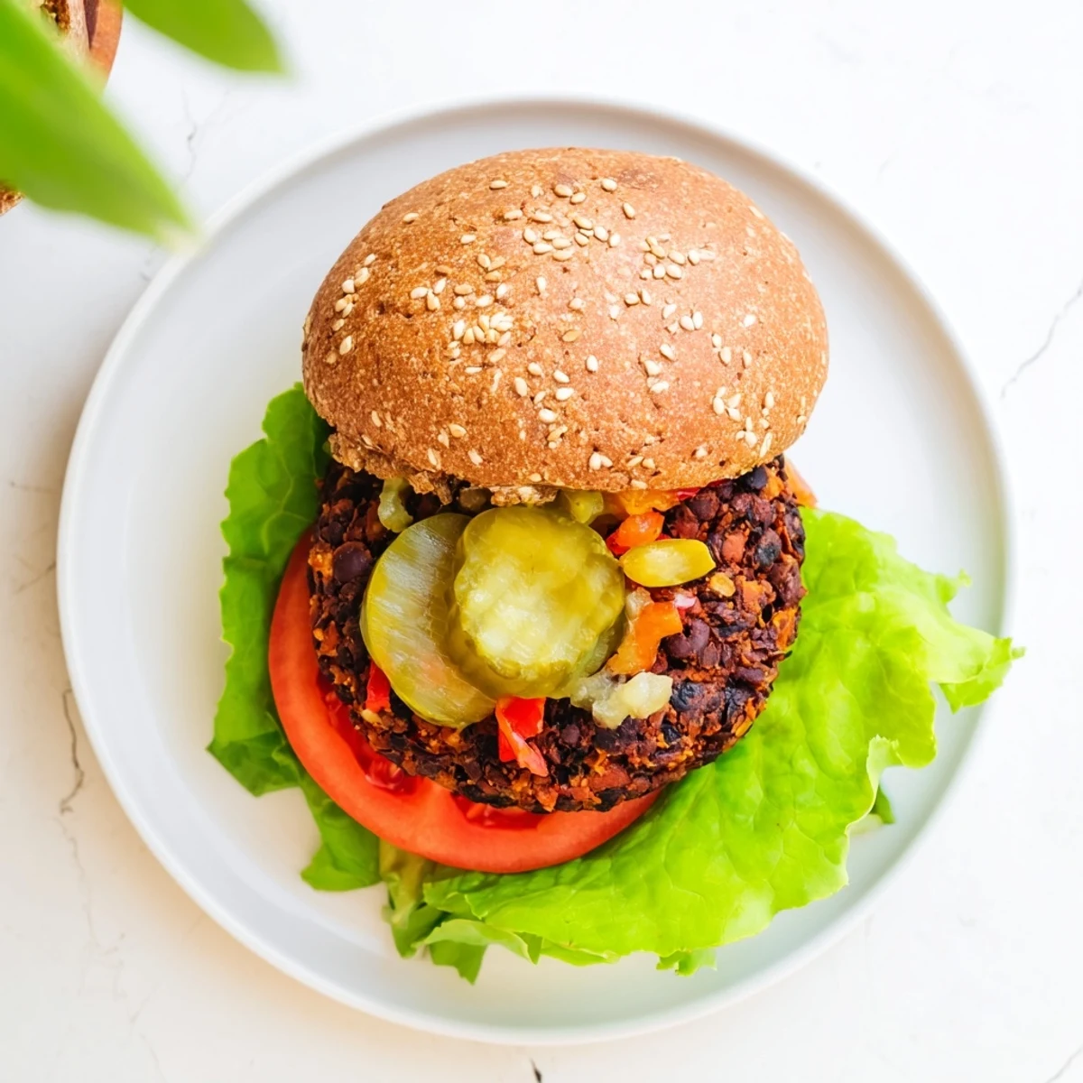 Hearty homemade veggie burgers recipe with black beans, fresh vegetables, and toasted whole wheat buns