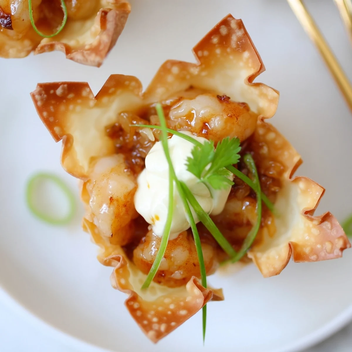 A platter of Crispy Shrimp Wonton Cups With Lime Cream, creamy zesty bite  