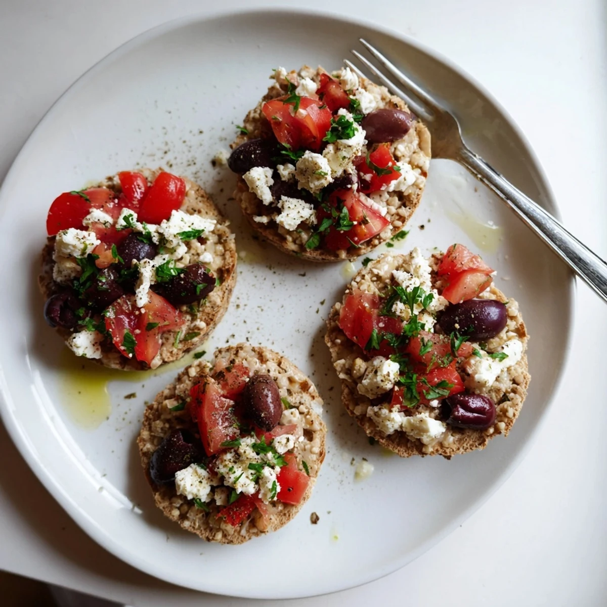 Crunchy Cretan feta rusks with crumbled cheese, olives, and a drizzle of olive oil