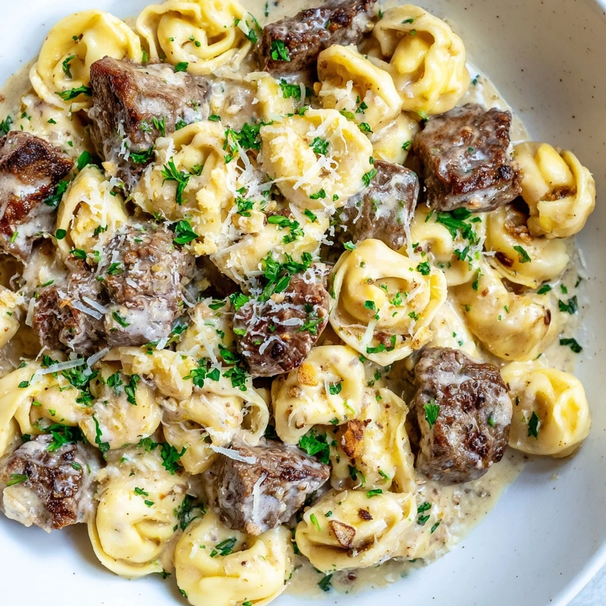 Golden-seared steak and plump tortellini coated in a velvety garlic Parmesan cream sauce