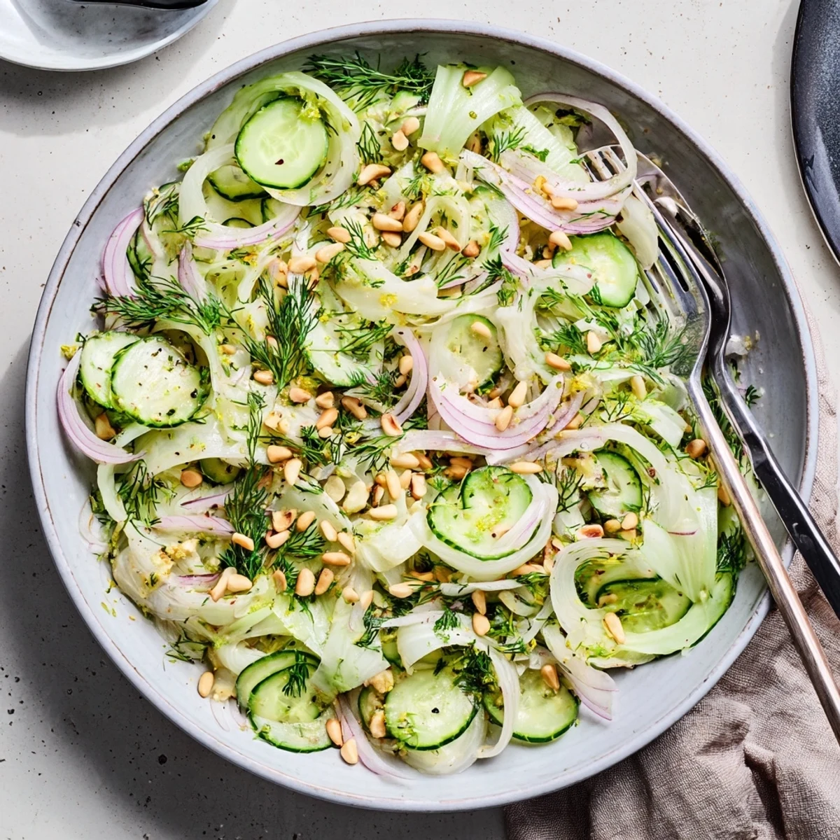 Thinly sliced fennel and cucumber tossed in a zesty lemon and olive oil dressing  