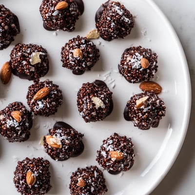 Rich melted dark chocolate coats crunchy toasted quinoa in these bite-sized gluten-free treats